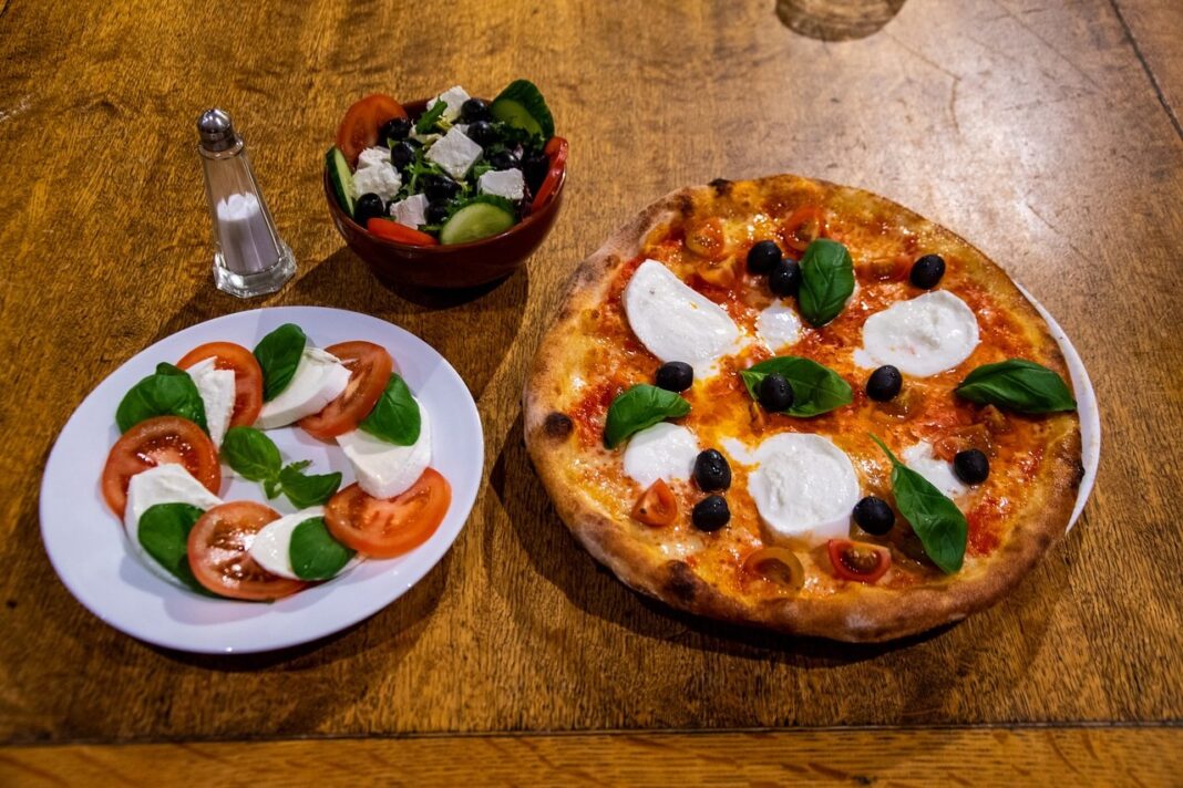 Why Insalata Greca Pizza in London is a Must-Try Dish Insalata greca pizza in London