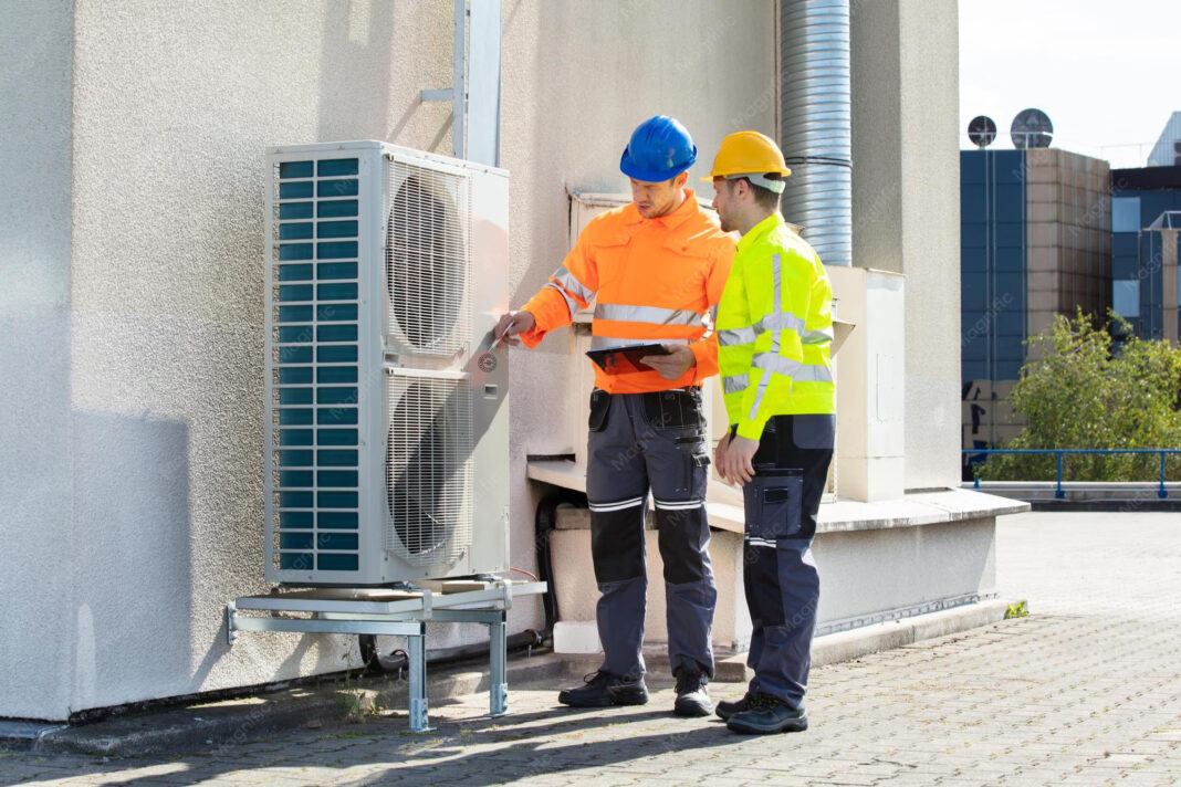 electrician-men-checking-air-conditioning-unit_1016675-2761 air conditioner installation
