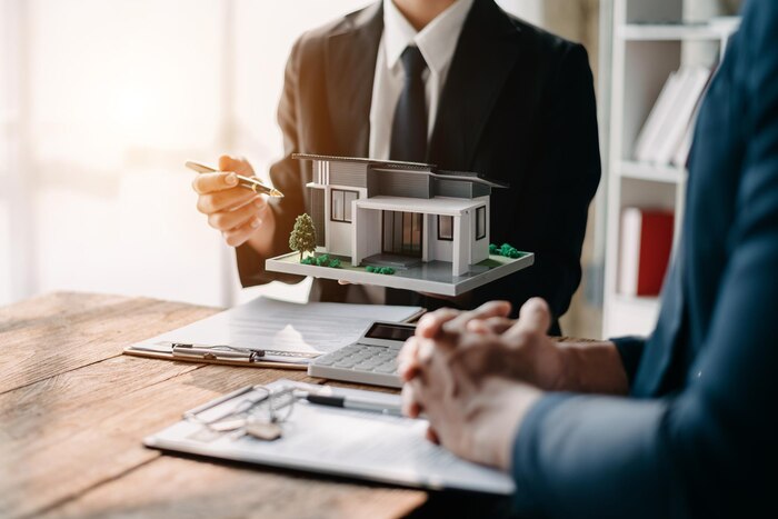 considering-buying-home-investing-real-estate-broker-signs-sales-agreement-agent-lease-agreement-successful-deal-xa_533878-752 real estate broker
