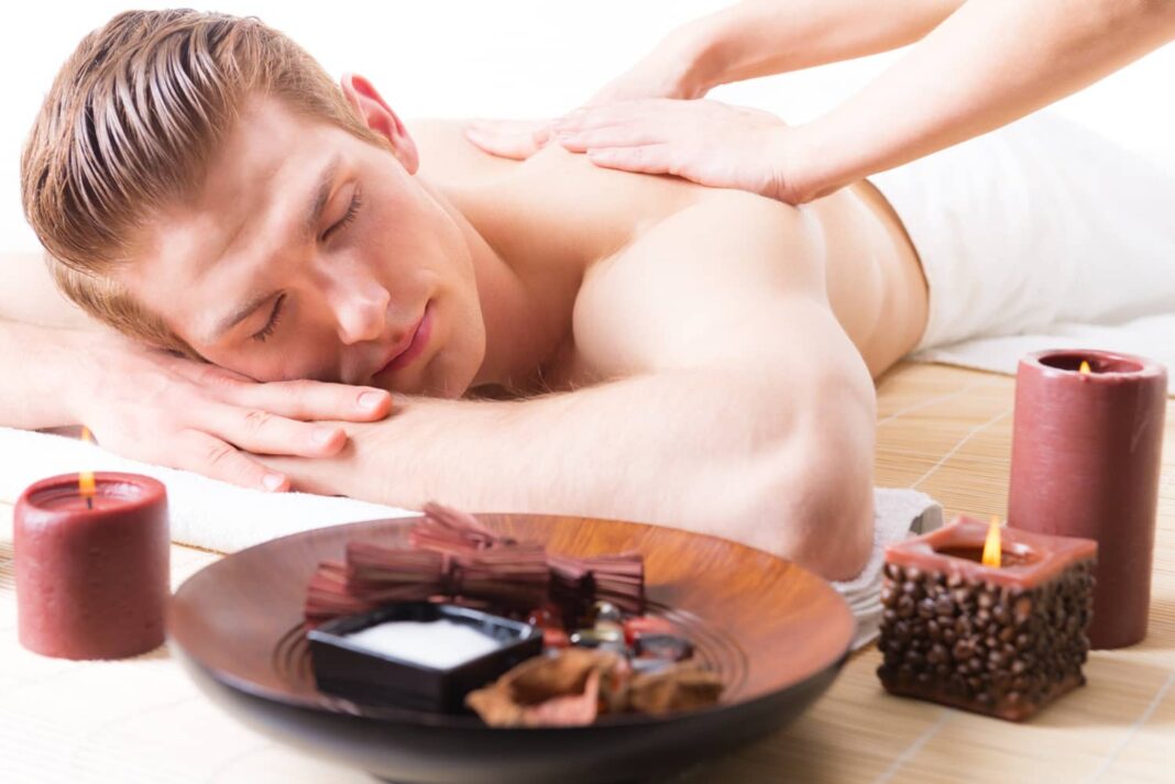 handsome-man-lying-spa-salon-enjoying-deep-tissue-back-massage Relaxing Massage